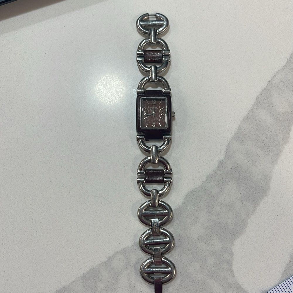 Vintage FOSSIL F2 ES-1981 stainless steel with brown leather links.  EUC